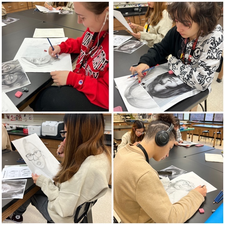 Drawing and painting students working diligently on their self portraits and doing amazing work!
